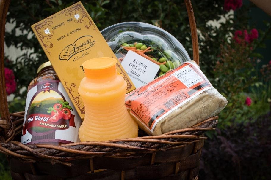 a gift basket filled with snacks and drinks