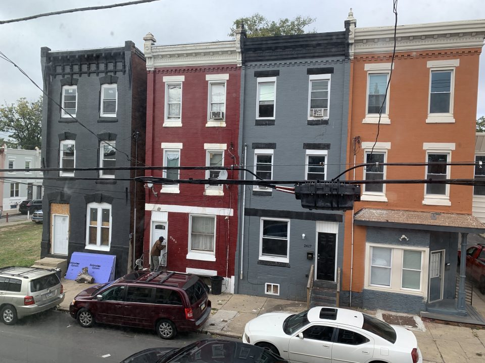 a row of cookie cutter houses in philly