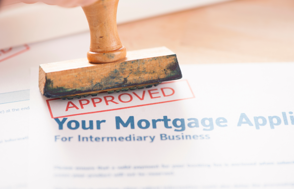 mortgage paperwork being stamped approved