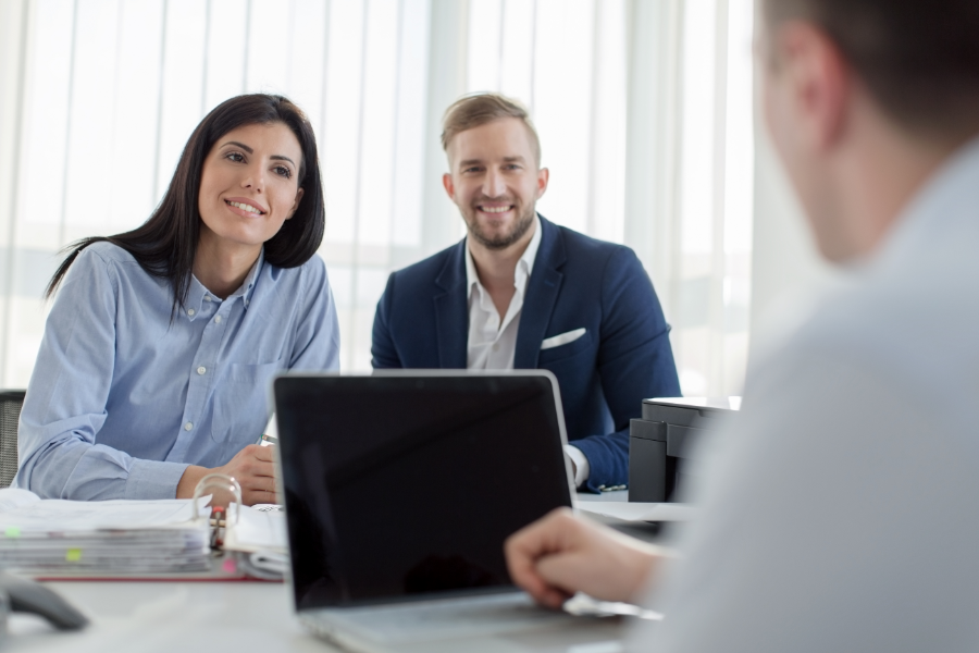 man discussing property business with a property management company