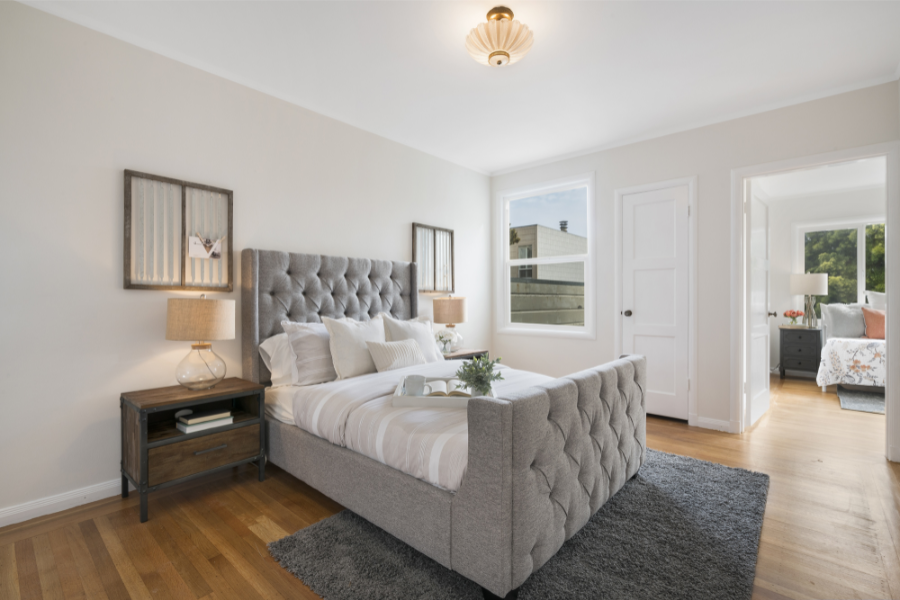 a master bedroom designed with a floor rug