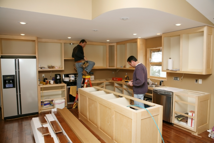 two men remodeling a kitchen