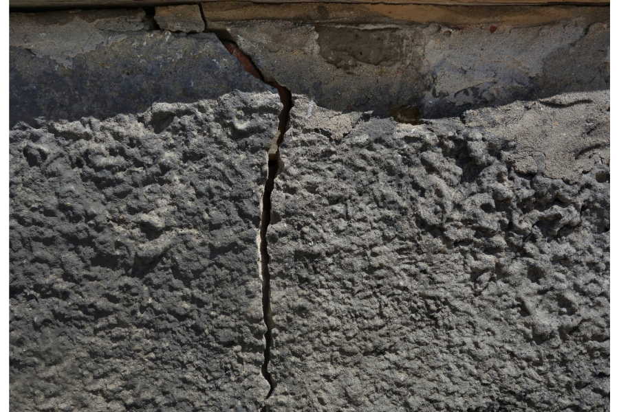 a close up of a crack in a property foundation