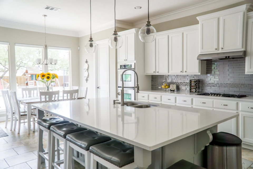 a new modern kitchen with an island